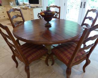 Round pedestal dining table with 5 chairs