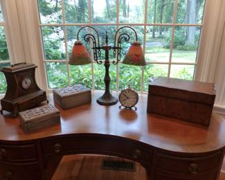 Kidney shaped desk, desk chair, lamp, bric-a-brac