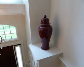 Pair of tall covered vases