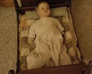 doll in bed