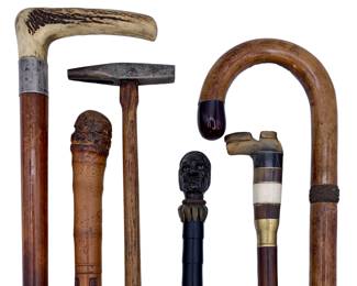 Gadget and Folk canes: one hallmarked Silver with antler handle, one crook flashlight, A R Robertson Boston Mass. tool cane, another a brass/horn/bone boot