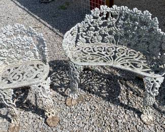 Ornate openwork Hefty cast iron garden bench and chair 