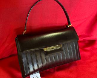 BUY IT NOW! $200. St. John, Black Leather Handbag. Dimensions are 10"W x 6"H x 2.5"D. New.