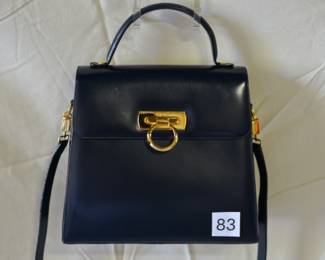 BUY IT NOW! $300. Vintage Salvatore Ferragamo Navy Calfskin Leather and Gold-Tone Hardware Gancini Handbag. Dimensions are 10.25"W x 9.5"H x 5.5"D.