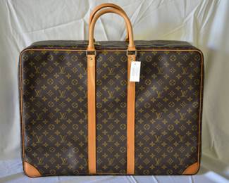 BUY IT NOW! $900. Louis Vuitton Suitcase. Sirius 60. SP0976. Coated Canvas with Leather Trim. Made in Spain, July 1996. Brand new! Dimensions 24”W x 18”H x 7.5”D.