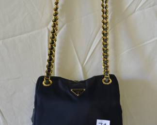 BUY IT NOW! $700. Vintage Prada Tessuto, Navy Nylon and Leather/Chain Link Tote Bag. Dimensions are approx. 10"W x 9"H x 5"D.