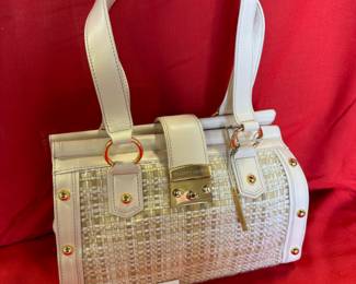 BUY IT NOW $100. Elliott Lucca, Natural Leather and Woven Fabric Handbag. New. Dimensions are 12.5"W x 8.5"H x 4.5"D.
