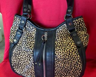 BUY IT NOW! $80. 9West Black and Cow Print, Leather and Horse Hair Handbag. New. Dimensions are 13.5"W x 10.5"H x 4.5"D.