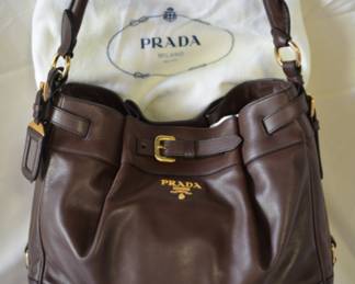 BUY IT NOW! $800. Vintage Prada Brown (Caffe) Cervo Hobo Bag. Dimensions are approx. 13"W x 11"H x 6"D.