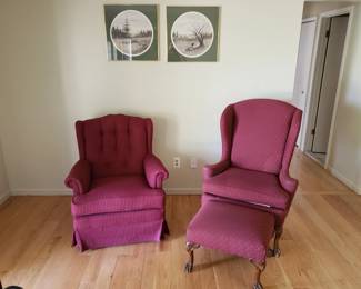 Wingback chairs, one with ottoman.