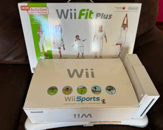 Wii  fit plus  New inbox and we sports complete