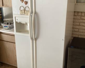 GE side-by-side refrigerator, works well