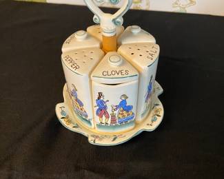 Vintage Royal Sealy spice and shaker rack featuring cloves, nutmeg, allspice, cinnamon, salt and pepper