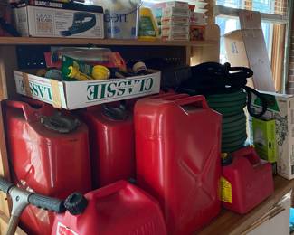 Gas cans, new garden hoses and yard items