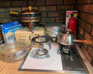 Tons of fondue sets candle & Electric.