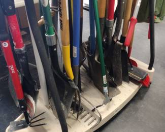 Lots of like new yard equipment. shovels, rakes, etc.