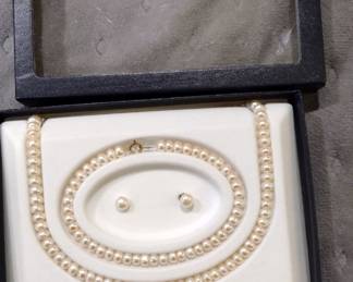 Genuine freshwater cultured pearls. and 10 karat gold. set