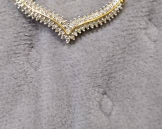 Beautiful 14 karat gold necklace with lots of diamonds