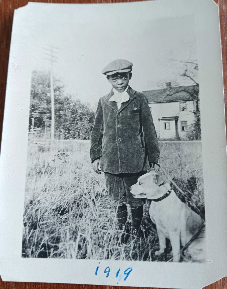 Unidentified boy with dog, 1919