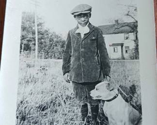 Unidentified boy with dog, 1919