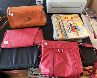One DOONEY & BOURKE Brown All
Weather Leather Bag Purse $25
Red leather bag $10
Clutch leather bag $10
