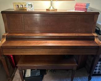 Everett Piano
56" Wide c 45" High x 25" Deep 

