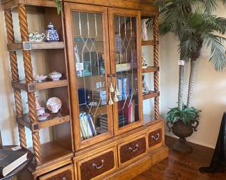 Very unique display cabinet with leaded glass doors and barely twist accents. 