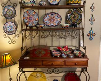 Very nice wine rack - display cabinet. Beautiful Handpainted pottery serving pieces from Mexico & Italy. 