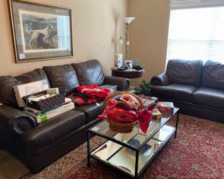 Matching brown couch and love seat , metal & glass coffee table , Arkansas razorback items, Wii sport, 