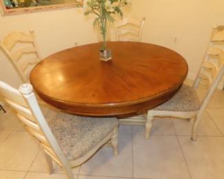 Nice round dining table and 4 chairs. 