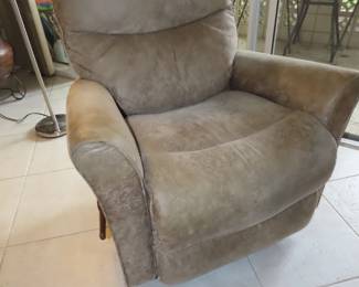 One of two faux suede rcliners.