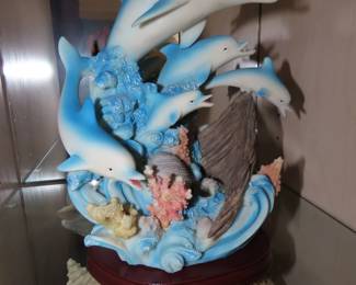 Resin dolphins.