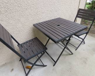 Folding patio chairs and table.