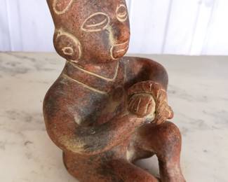 Mesoamerican Clay Statue of Sitting Man & Leaf
