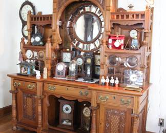 Beautiful breakfront heavily carved with beveled glass mirrors