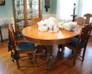 Antique oak pawfoot dining table with chairs