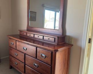 Wooden cedar-lined dresser with mirror