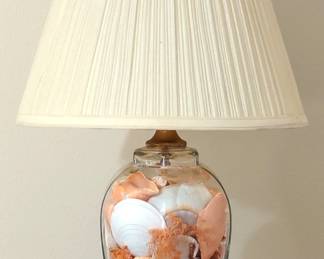 Vintage Seashells Nautical Table Lamp.  Beautiful table lamp containing specimen seashells encased in glass with a ceramic base and lamp shade.