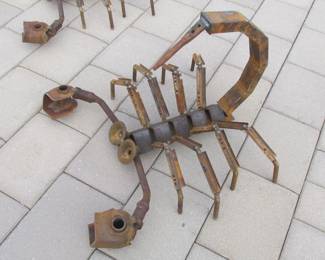 Heavy metal yard art scorpion.
