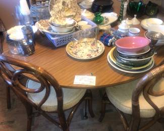 Mid century table 48"
(Six chairs included)
$60