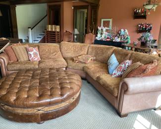Leather and upholstered curved sectional