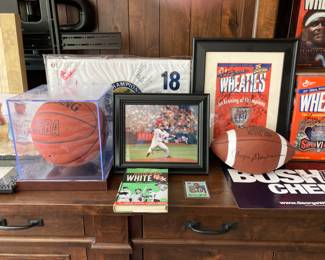 Many signed sports memorabilia 