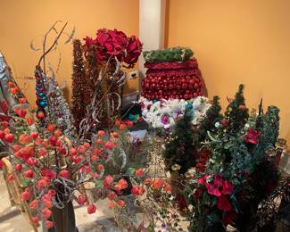 Tons of Christmas items and Christmas trees