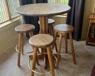 Pub table & stools $300

36”Dia x 43”H
Stools swivel 30”H