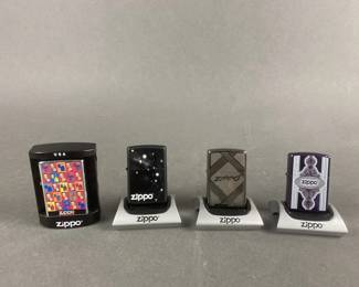 Lot 486 | 4 Zippo Lighters