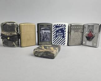 Lot 569 | Zippo Armor & Graphic Lighters