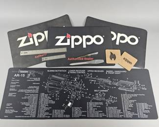 Lot 591 | Zippo Mats, Accessories & More!