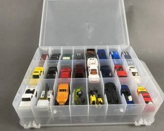 Lot 125 | 48 Hot Wheels/ Matchbox Cars With Case