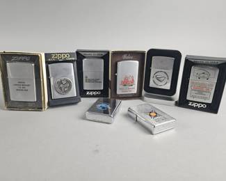 Lot 574 | Zippo Advertising Lighters & More!