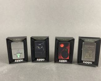 Lot 532 | Black Cat Zippo Lighters & More